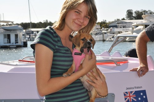 Jessica Watson making friends with ’Lady’, the adorable puppy belonging to Jenny Leigh-Smith. - Jessica © Dave Jeffress